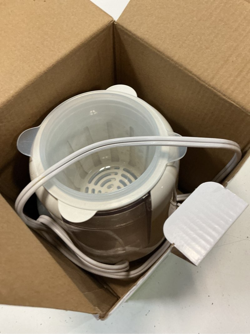 Condition photo showing As Is for parent s choice electric baby bottle warmer and sterilizer