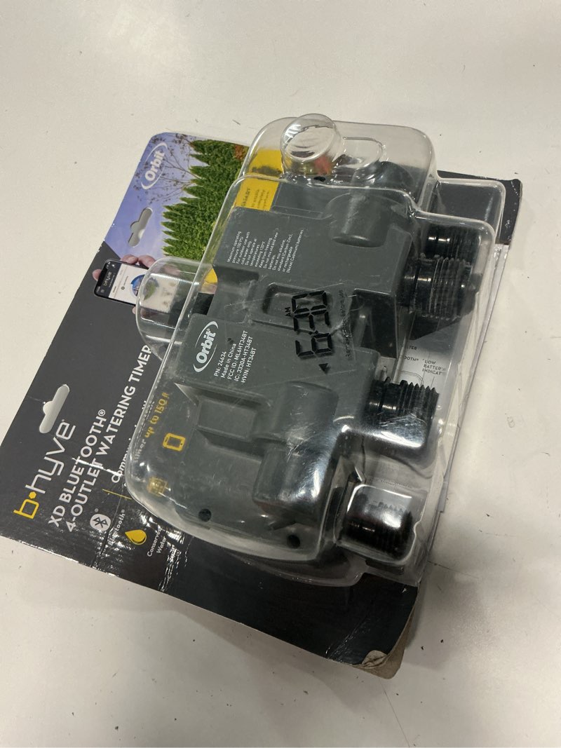 Condition photo showing As Is for orbit b-hyve xd 4-port smart hose watering timer - app controlled - smart weathersense - bluetooth sprinkler timer with remote control - multi outlet yard irrigation system - 24634 4-port bluetooth