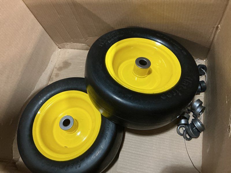 Condition photo showing As Is for 2 pcs 11x4.00-5" lawn mower tires flat free,3/4" 5/8" 1/2" bushing,3.4"-4"-4.5"-5" centered hub,universal fit smooth tread tire for zero turn lawn mowers, with universal adapter kit(blcak rim) universal bushing adapter (3/4", 5/8", 1/2") black rim