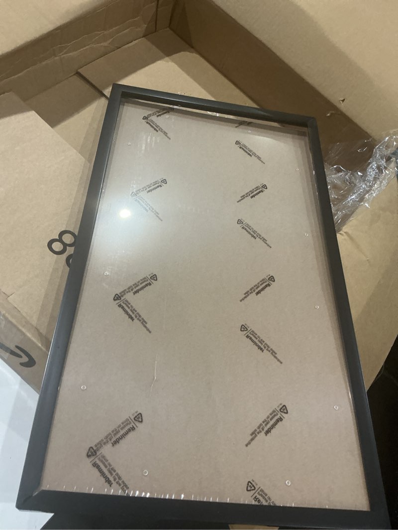 Condition photo showing As Is for naokboee13”x22” picture frame in black, photo frames with plexiglass, horizontal and vertical formats for wall and tabletop
