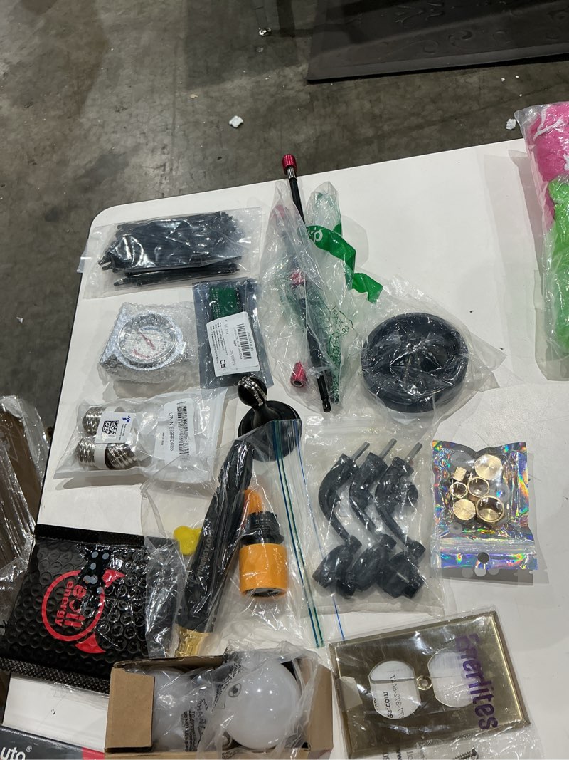 Condition photo showing As Is for assorted home improvement lot (small tools, screw, home accessories, etc.)