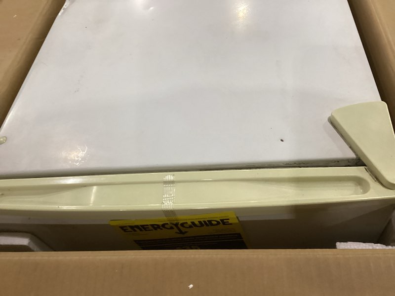 Condition photo showing As Is for not tested damaged electactic 3.2 cu.ft mini fridge with freezer, compact refrigerator with reversible single door, adjustable thermostat, low noise, energy efficient for office, dorm, bedroom, apartment (white) white 3.2 cu.ft