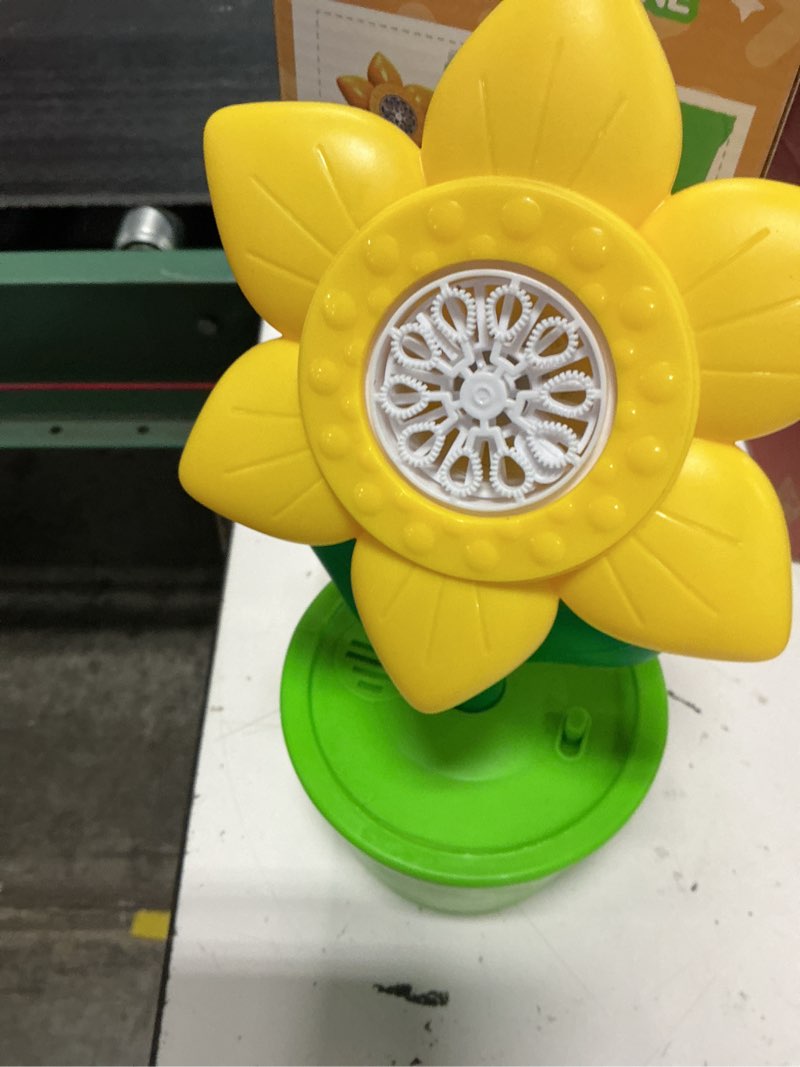 Condition photo showing Good Condition for toy life daisy bubble machine with led lights and music, automatic bubble maker for indoor outdoor birthday parties, easter, wedding, portable battery operated bubbles blower gift for girls boys daisy bubble machine-yellow