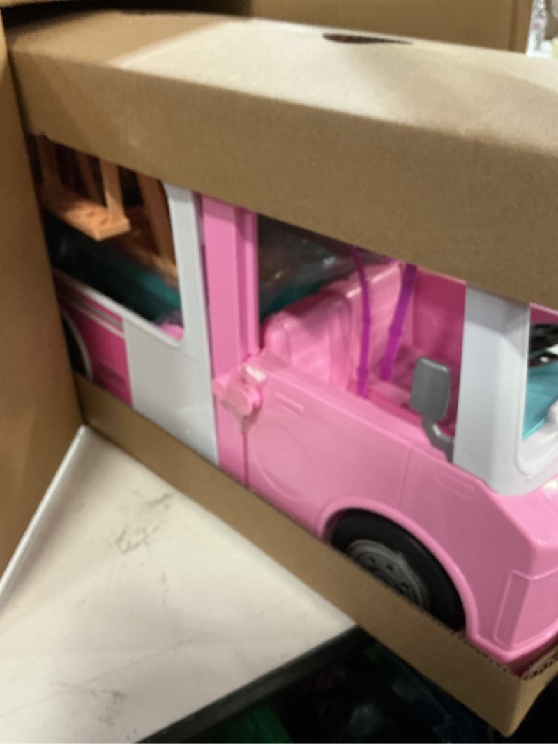 Condition photo showing New/Like New for barbie camper, doll playset with 50 accessories, transforms into truck, boat & house, includes pool, 3-in-1 dream camper (amazon exclusive)