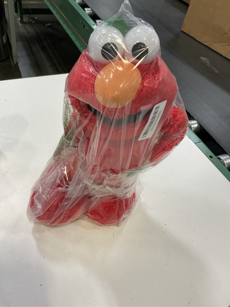 Condition photo showing Good Condition for sesame street hokey pokey elmo 14” interactive plush toy, sings, dances & plays music, bilingual stuffed animal for pretend play, soft & huggable, ages 18 months and up by just play