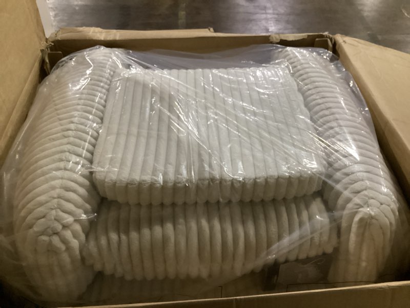 Condition photo showing Good Condition for Signature Design by Ashley Tie-Breaker Cozy Contemporary Manual Press-Back Swivel Glider Rocker Recliner with 2 Bolster Pillows and Hidden Storage, White