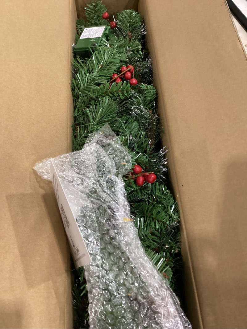 Condition photo showing Good Condition for national tree company 9 ft pre-lit crestwood spruce artificial christmas garland, christmas decoration with glitter, pinecones, red berries, 50 warm white led lights, 180 tips, timer, green battery operated tree
