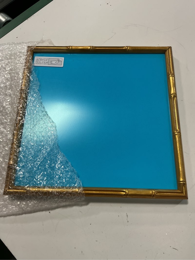 Condition photo showing Good Condition for poster palooza 12x12 frame gold bamboo solid wood square picture frame with uv acrylic, foam board backing & hanging hardware included gold bamboo 12x12