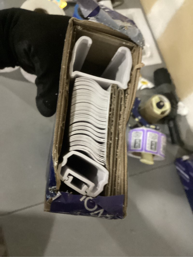 levolor vinyl blind, white. precut to 23" x 64". includes hardware . 