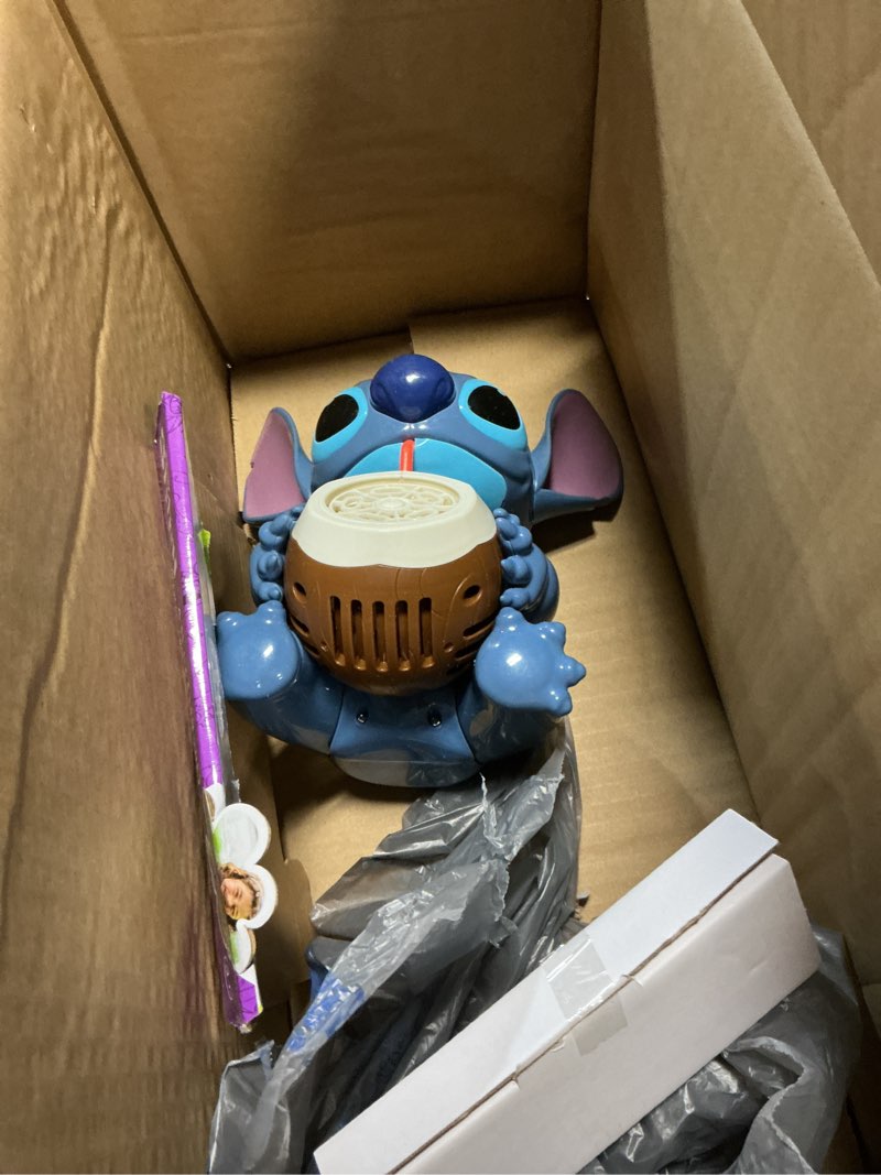 Condition photo showing As Is for little kids inc. disney stitch musical bubble machine, ages 3 and up
