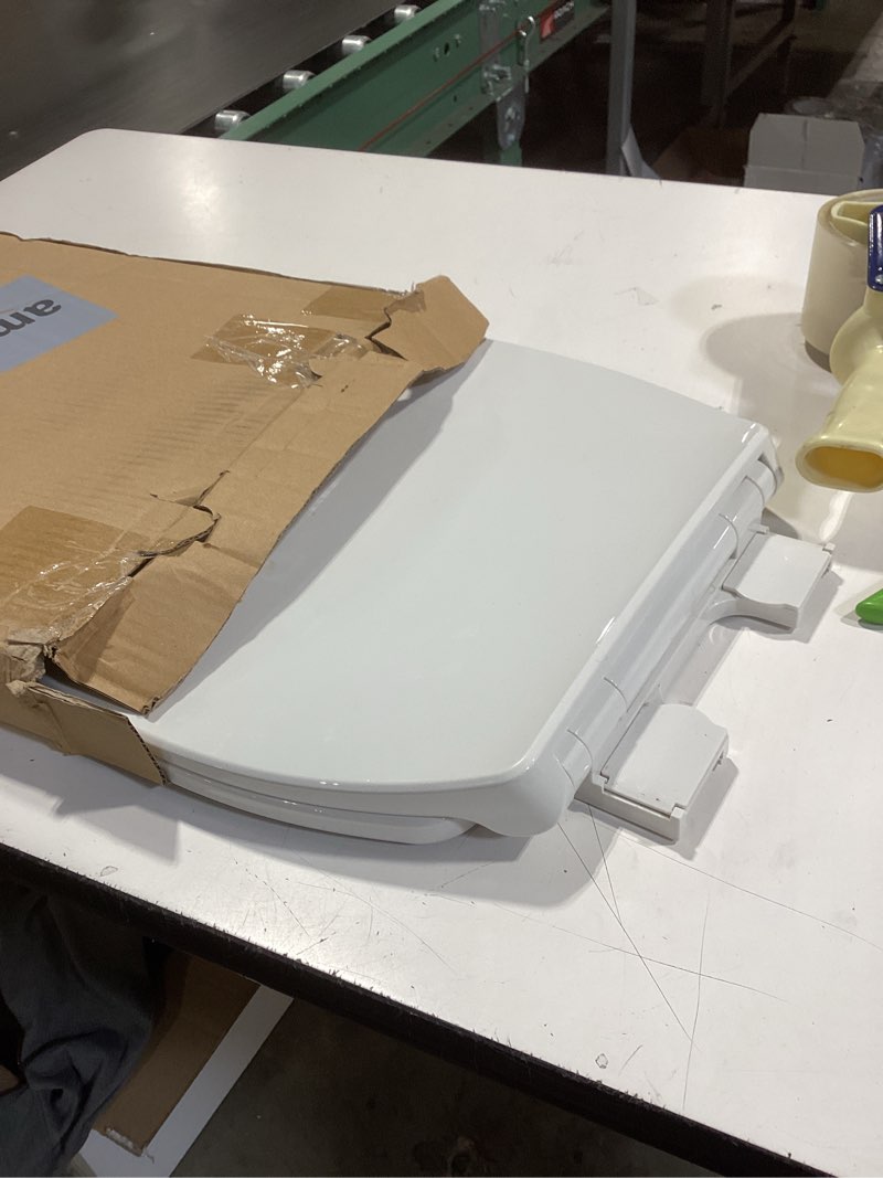 Condition photo showing As Is for 1m family toilet seat, patented slow close & quick releasing technology, anti-wiggling, easy to install and clean, standard elongated with toddler seat built in (1 piece) 1 elongated with toddler seat built in