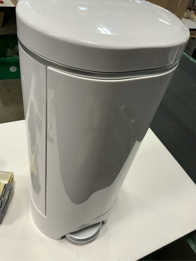 Condition photo showing Good Condition for munchkin® step™ infant diaper pail, powered by arm & hammer™, #1 in odor control, hands free, white