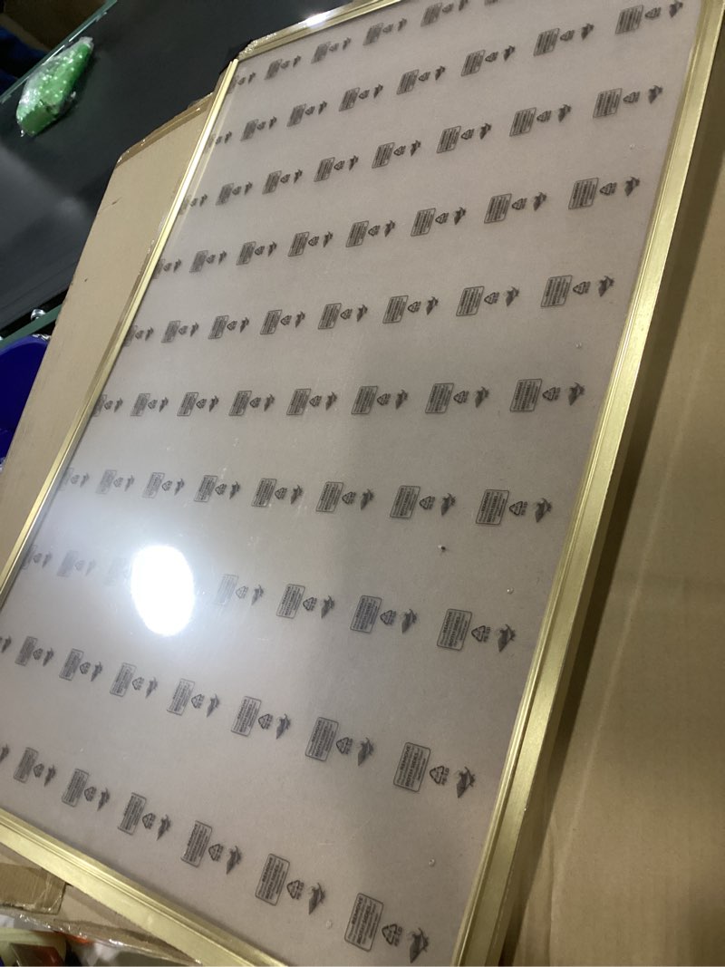 Condition photo showing Good Condition for GULETHUN 27x40 Picture Frame, Gold Poster Frame, Home Decor Natural Gallery Frames, Horizontal or Vertical Format, Sturdy, Plexiglass, Large Wall Decor, for Photos, Artworks, Posters Gold 27x40in