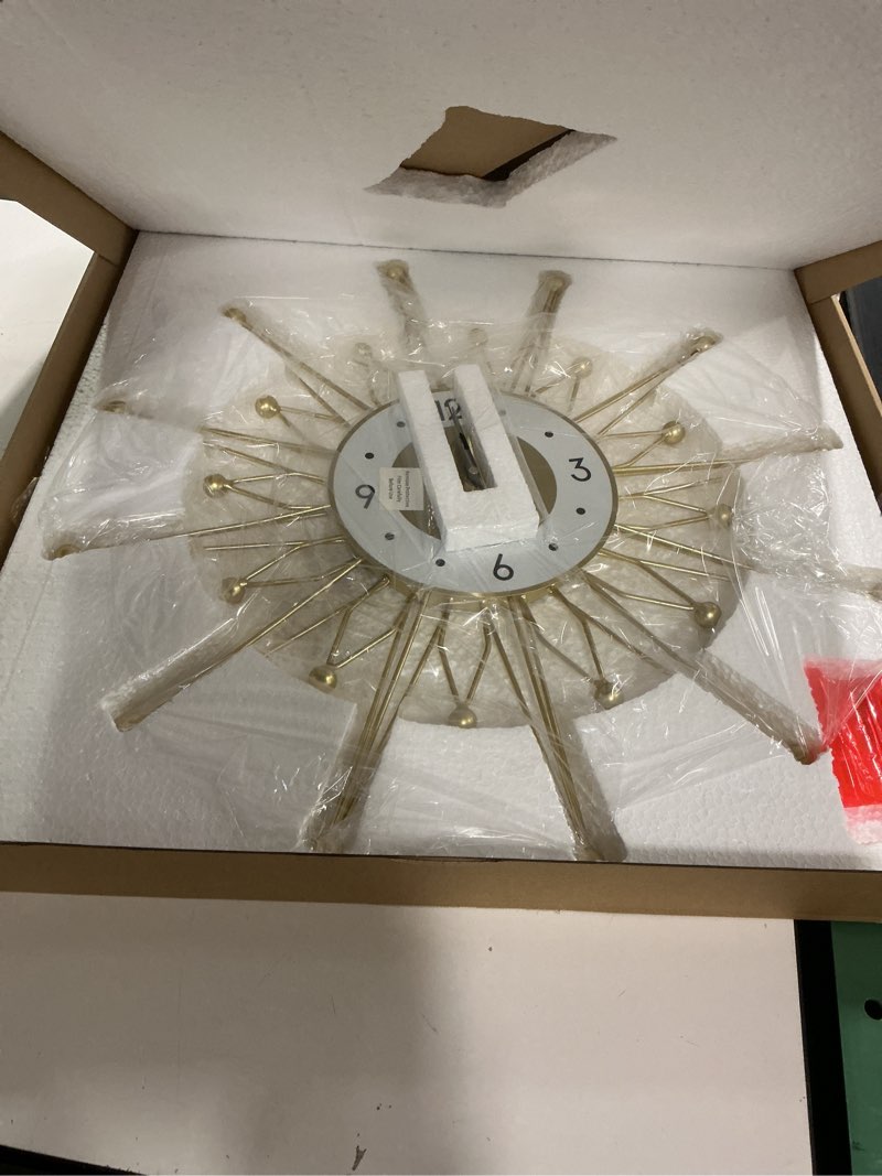 Condition photo showing Good Condition for Lafocuse Silent 23 Inch Metal Large Gold Wall Clock Modern, Mid Century Wall Clocks Battery Operated, Art Deco Starburst Wall Clocks for Living Room Kitchen Office