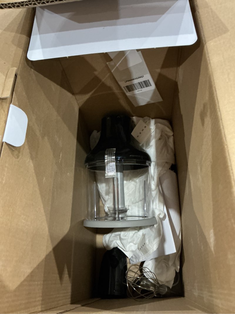 Condition photo showing As Is for smeg handheld immersion blender with beaker, chopping bowl w/lid, wire whisk, 5 speed controls, made with stainless steel blades and ergonomic design (black)