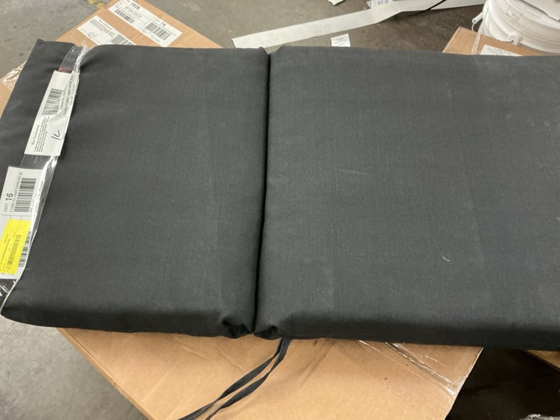 Condition photo showing As Is for mainstays 37" l x 19.5" w black 1 piece rectangle outdoor chair cushion