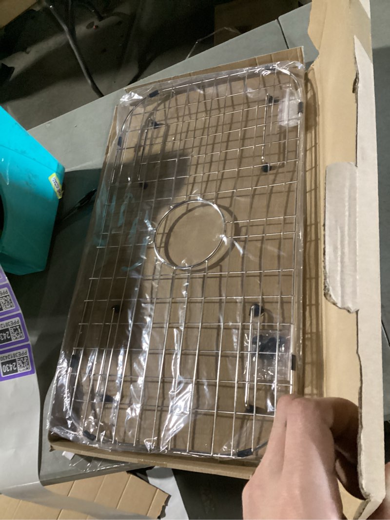 Condition photo showing New/Like New for Sink Protector Grid 26-1/16" x 14-1/16", Centered Drain with Corner Radius 3-1/2", 304 Stainless Steel Material (Centered Drain) for Single Bowl Kitchen Sink 26-1/16" x 14-1/16" Centered Drain