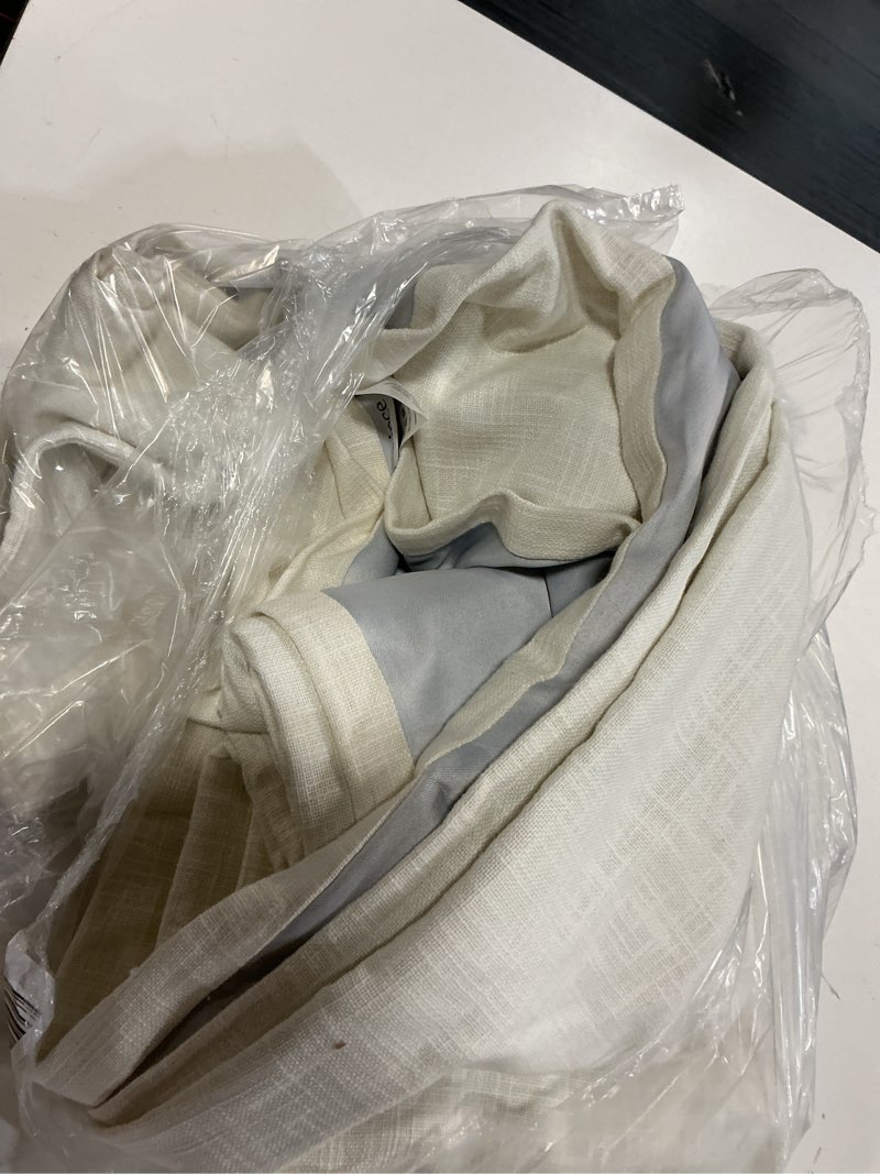 Condition photo showing Good Condition for textured cotton room darkening curtain, 48x96, ivory