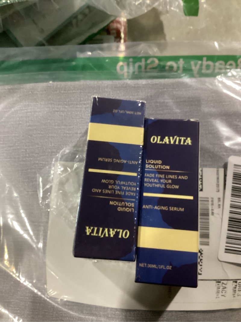 Condition photo showing As Is for Facial Serum, Olavita Liquid Solution Anti Aging Serum, Vitamin C & E Serum, Promotes Skin Collagen Production, Smoothes Wrinkles and Fine Lines (2PCS)