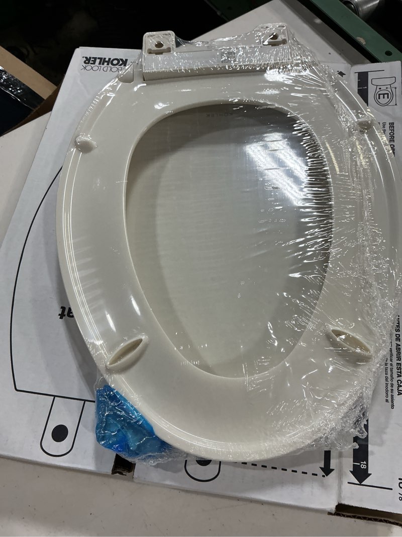 Condition photo showing New/Like New for kohler 20110-96 brevia, slow close toilet seat, elongated toilet seat, grip-tight bumpers quick-attach hardware, biscuit biscuit elongated quiet-close