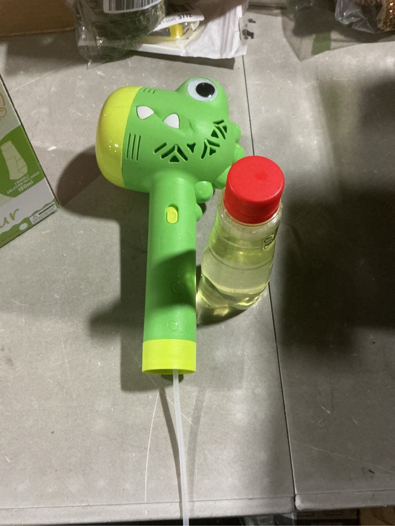 Condition photo showing New/Like New for bubble machine for kids | outdoor toys for toddlers age 3-5 | perfect as a gift for party favors birthdays valentine halloween and christmas | battery operated bubble wand for easy outdoor use green
