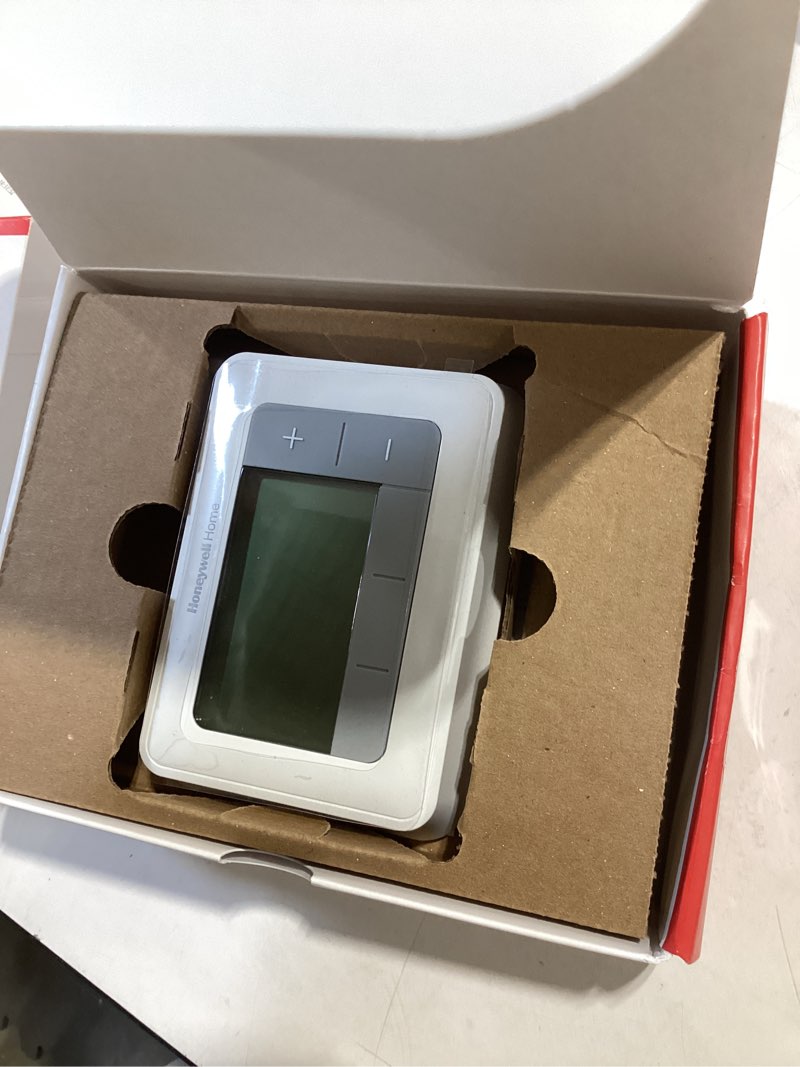 Condition photo showing As Is for White T5 Touchscreen Programmable Thermostat (7-Day) | Honeywell