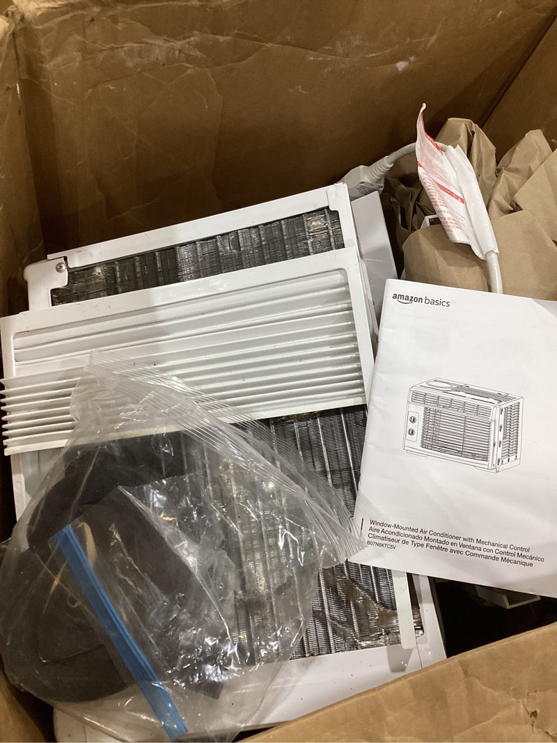 Condition photo showing As Is for amazon basics 5000-btu window air conditioner with quiet operation, up to 150 sqf, cool and fan functions, washable filter, adjustable window kit, intuitive mechanical controls, for small room, white white 5000 btu