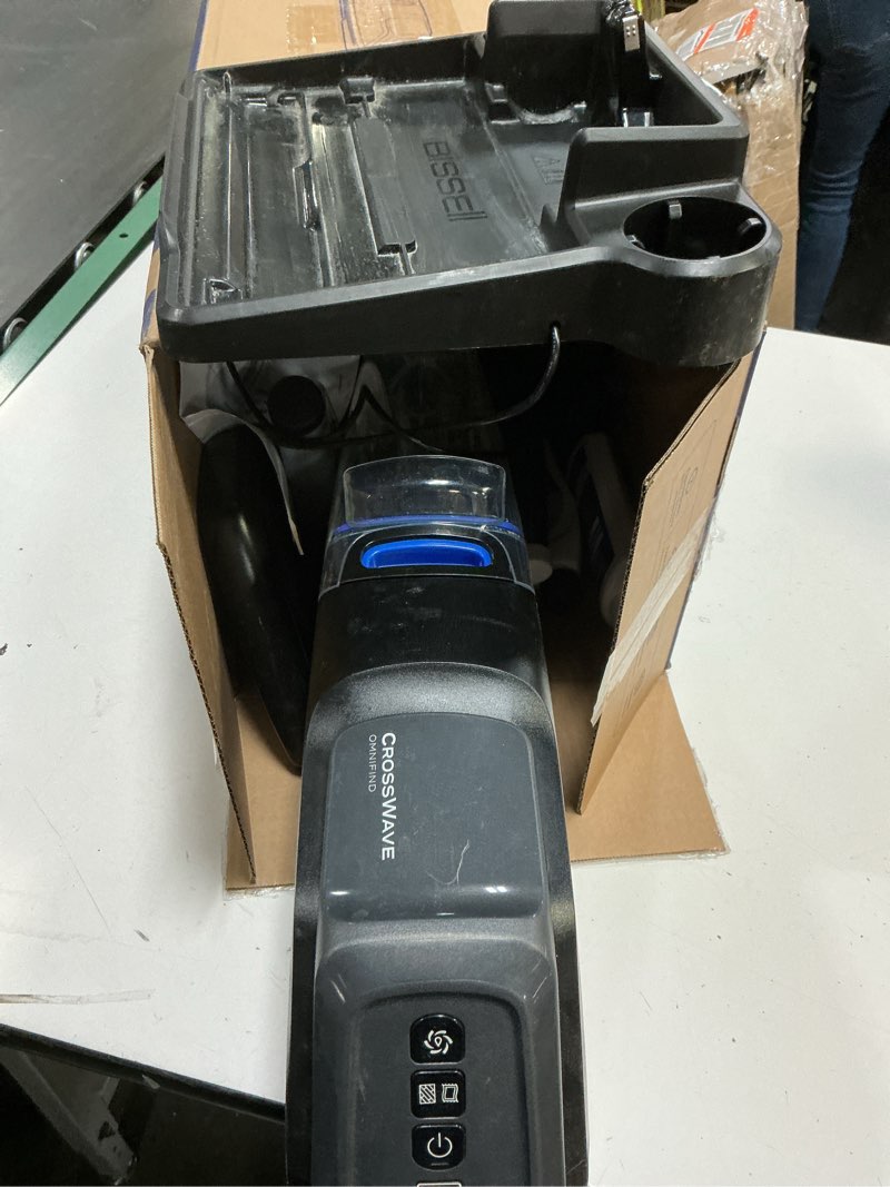 Condition photo showing As Is for bissell crosswave cordless plus, wet dy vacuum w/furfinder headlights + super concentrate multi surface formula for sealed hard surfaces and area rugs