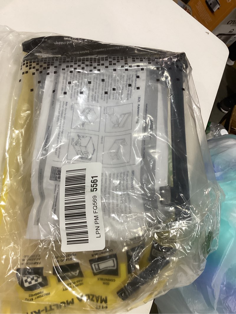 Condition photo showing As Is for Metra Electronics 99-7505 Single or Double DIN Installation Multi-Kit for Select 1994-2006 Mazda Vehicles -Black,Silver