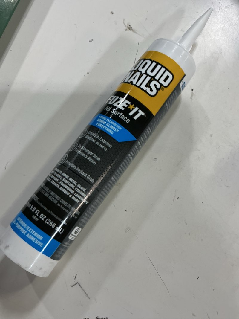 Condition photo showing New/Like New for liquid nails ln-2000 6 pack 9 oz. fuze it all surface construction adhesive, gray