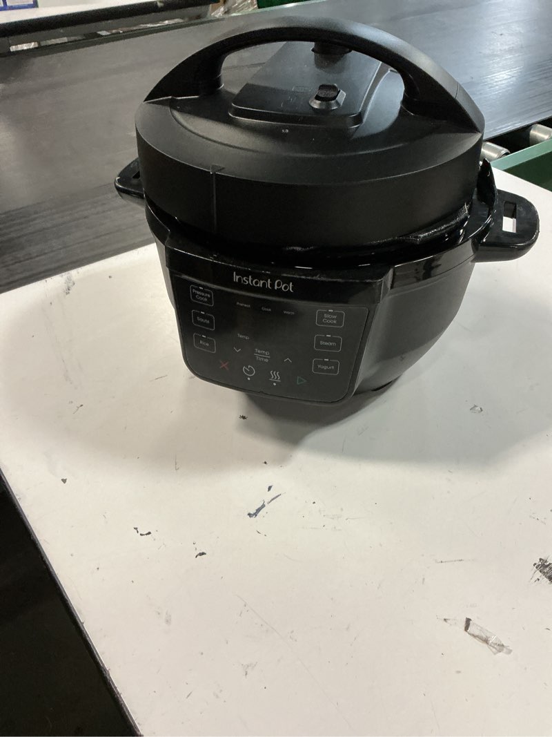 Condition photo showing As Is for instant pot 4qt rio mini 7-in-1 multi-cooker, pressure cooker, slow cook, sauté, steam, rice maker, yogurt, & warmer, black, 4 quarts black 4 quarts