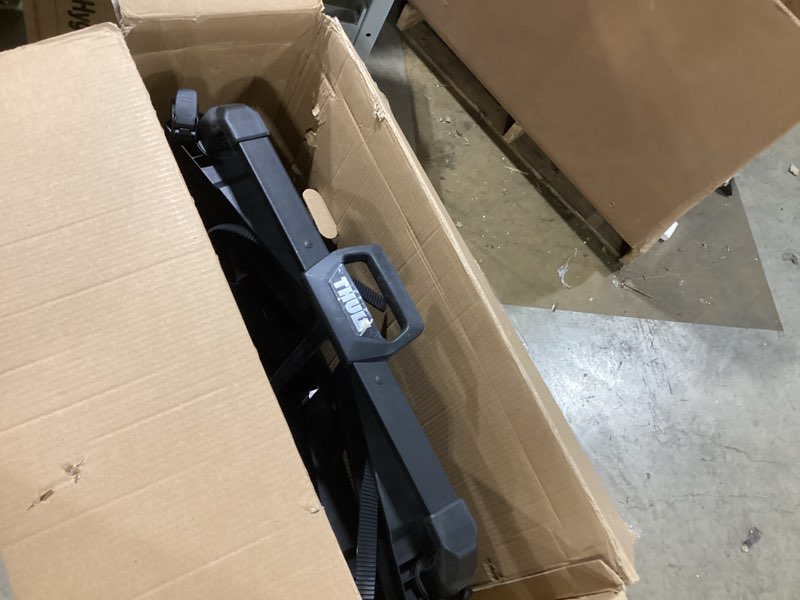 Condition photo showing As Is for thule outpace 2 bike hitch rack - compact & lightweight platform bike rack - foldable design - fits most bike styles - 110lb capacity 55lbs per bike - 2" & 1.25" hitch compatibility