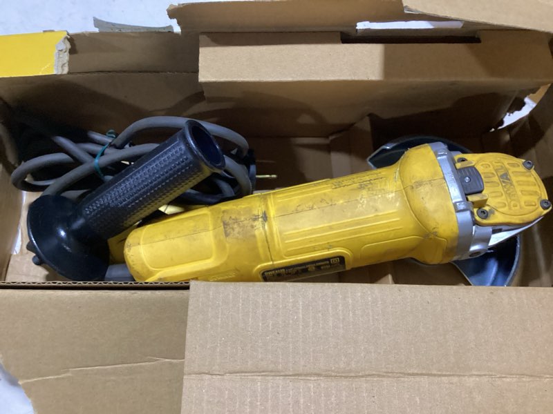 Condition photo showing As Is for dewalt 4.5-in 9 amps paddle switch corded angle grinder (battery and charger not included)
