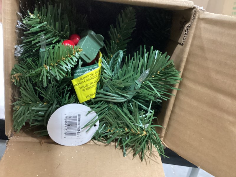 Condition photo showing Good Condition for national tree company 9 ft pre-lit crestwood spruce artificial christmas garland, christmas decoration with glitter, pinecones, red berries, 50 clear lights, 180 tips, green plug in tree