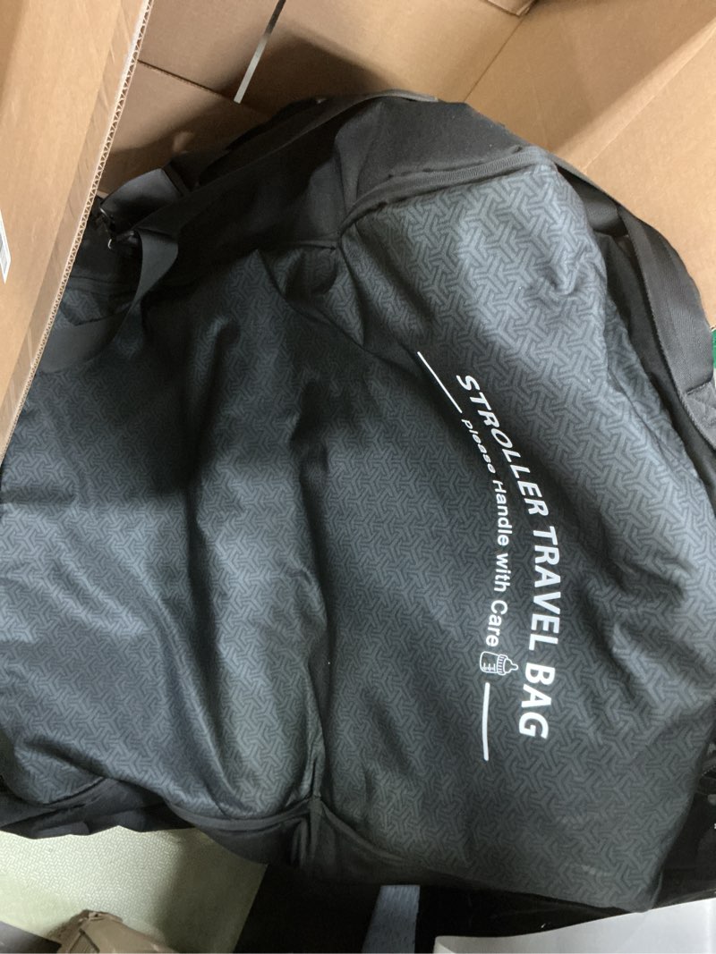 Condition photo showing As Is for raymace padded stroller travel bag for airplane,stroller gate check bag with wheels fits uppababy vista v2,cruz v2(remove rear wheels), travel safe protection storage bag, patterned design,black