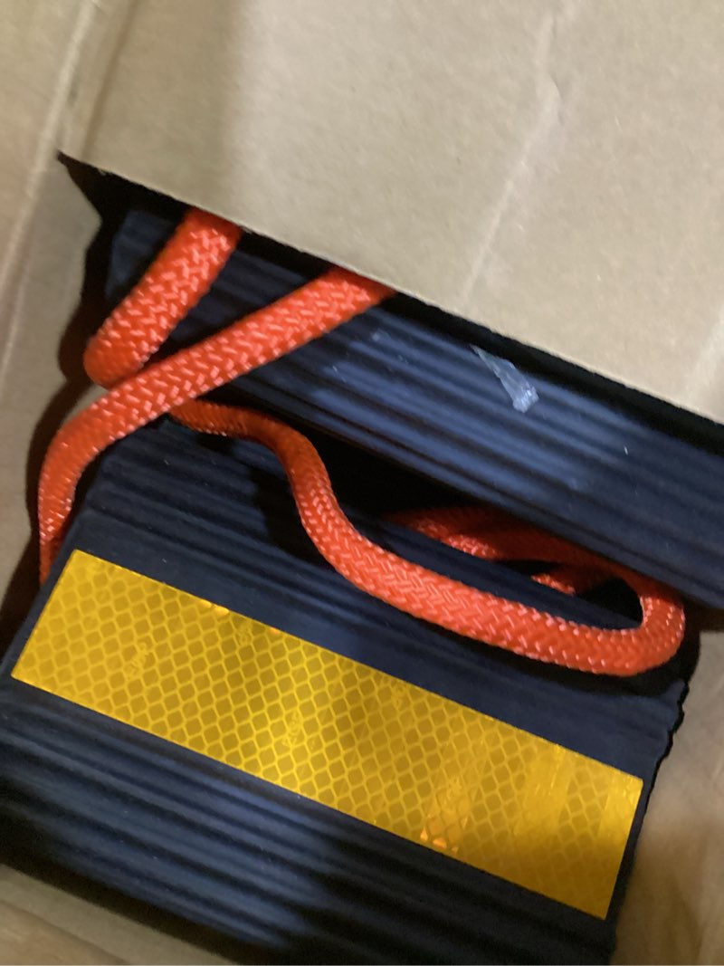 Condition photo showing Good Condition for 4 pack rubber wheel chocks for rv trailer with rope & reflective strips, heavy duty non-slip tire stopper for camper, truck, car, travel trailer