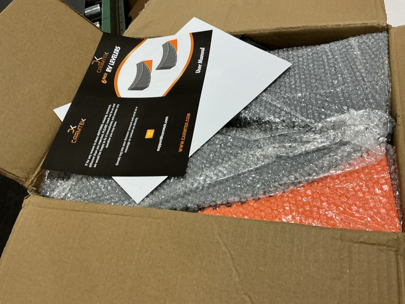 Condition photo showing Good Condition for carmtek camper leveler premium kit | 6 inch rv levelers with wheel chocks, rubber mats & carry bag for travel trailers | faster rv leveling system than rv leveling blocks | rv accessories 2-pack + bag + mats