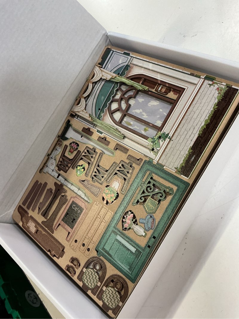 Condition photo showing Good Condition for cutebee book nook kit - diy miniature house dollhouse kit for adult and teens, booknook bookshelf decor alley model build with led light, gifts for family and friends (sunny cafe)