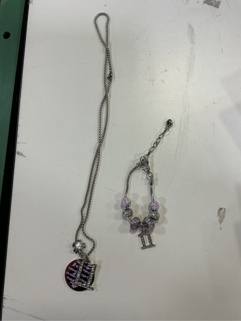 Condition photo showing New/Like New for verymerrymakering 11th b day purple gift set: necklace  bracelet  jewelry & decor