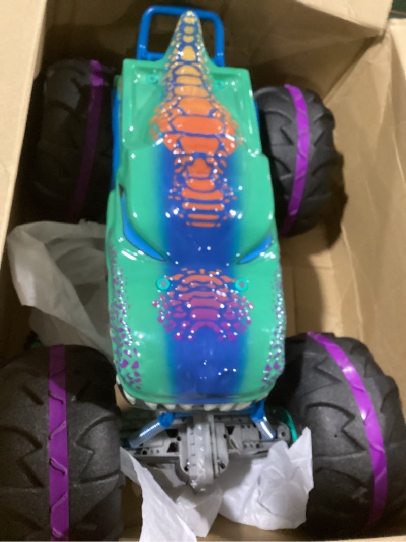 Condition photo showing As Is for Hot Wheels RC Monster Trucks Mega-Wrex in 1:6th Scale, Extra Large Remote-Control Toy Truck, More Than 2ft Long Multicolor