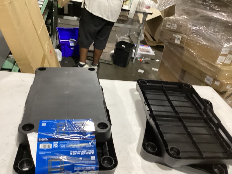 Condition photo showing New/Like New for project source plastic 4-tier utility shelving unit (22-in w x 14.25-in d x 48-in h), black, (66-lb capacity per shelf)