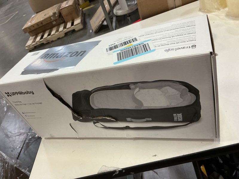 Condition photo showing New/Like New for UPPAbaby Travel Bag for RumbleSeat and Bassinet - Easy-Carry Handles, Removeable Shoulder Strap + Durable Design with TravelSafe Protection 20x10x6 Inch (Pack of 1) Black/Blue