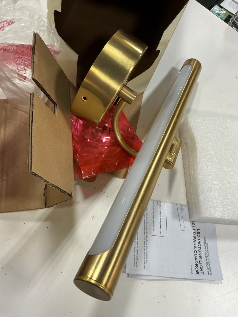 Condition photo showing As Is for allen + roth prichard brushed gold led battery picture light