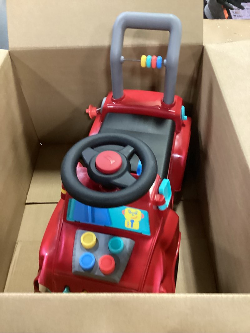 Condition photo showing As Is for Radio Flyer Busy Buggy Ride On Toy Car with 17 Interactive Activities, Sit-to-Stand for Ages 1-3, Features Built-in Storage, Walk or Ride Options for Toddler Development and Play