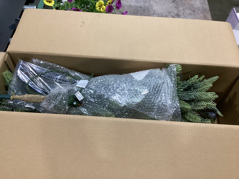 Condition photo showing As Is for puleo international 4.5ft pre-lit aspen fir artificial christmas tree with 250 clear lights, 411 realistic dense branch tips, easy setup artificial trees with sturdy metal stand 4.5' aspen fir with 250 clear lights