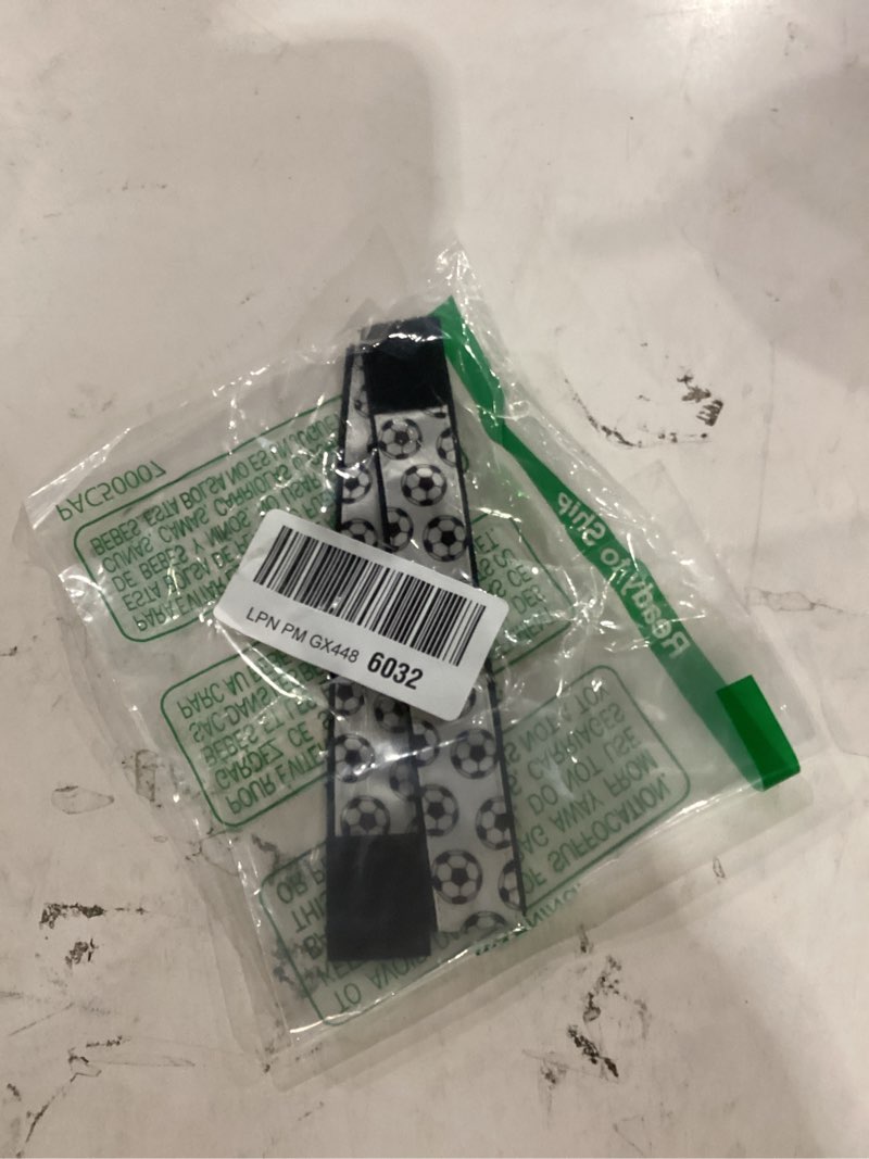 Condition photo showing Good Condition for soccer sleeve scrunchies (pair) white and black, from the original usa inventor - sleeve holders and straps