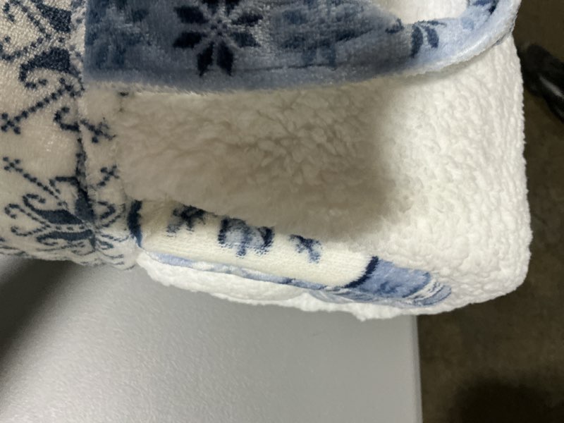 Condition photo showing New/Like New for member's mark plush comforter set features a cozy white and blue nordic snowflake pattern with a warm sherpa reverse