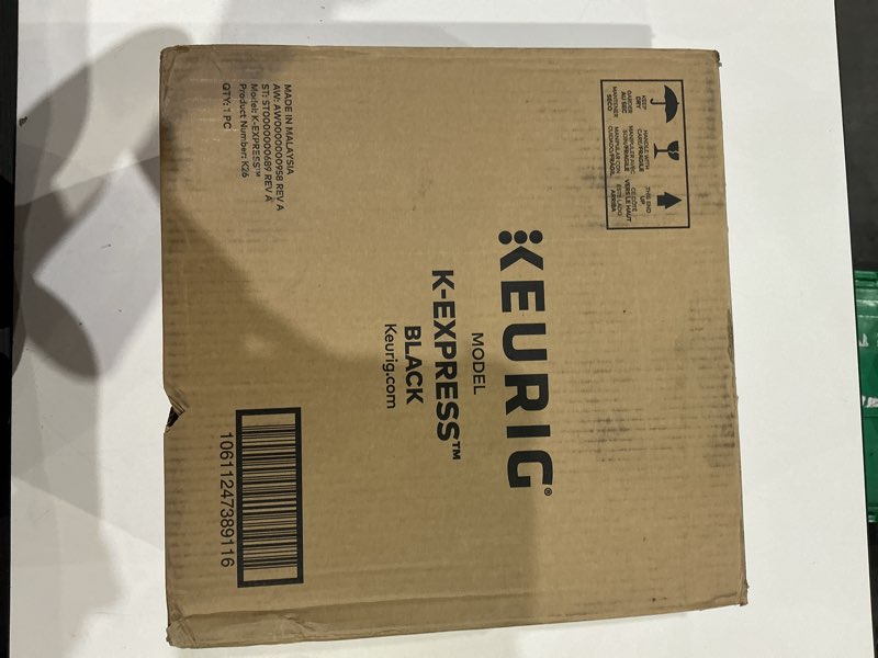 Condition photo showing As Is for keurig k-express single serve k-cup pod coffee maker, 3 brew sizes, strong button feature, 42oz removable reservoir, white