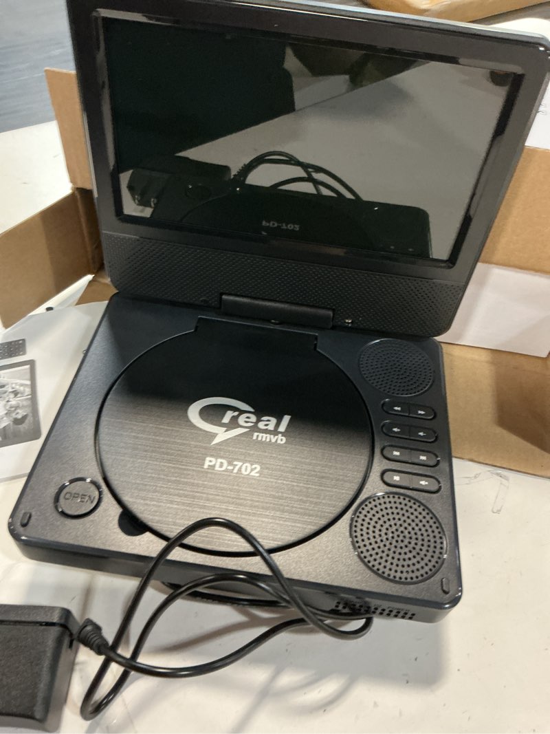 Condition photo showing Good Condition for 9.5" portable dvd player with 7.5" swivel display screen, 5-hour built-in rechargeable battery, car dvd player,supports sd card/usb/cd/dvd and multiple disc formats, high volume speaker pd-702