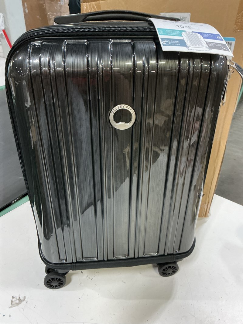 Condition photo showing Good Condition for delsey paris helium aero hardside expandable luggage with spinner wheels, brushed charcoal, carry-on 19 inch brushed charcoal carry-on 19 inch